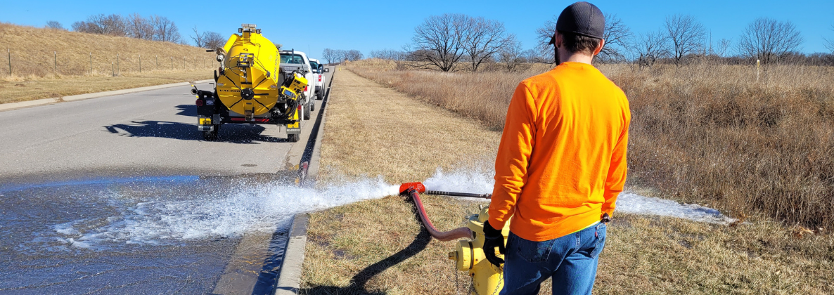 Photo of an Employee performing a Unidirectional Flushing