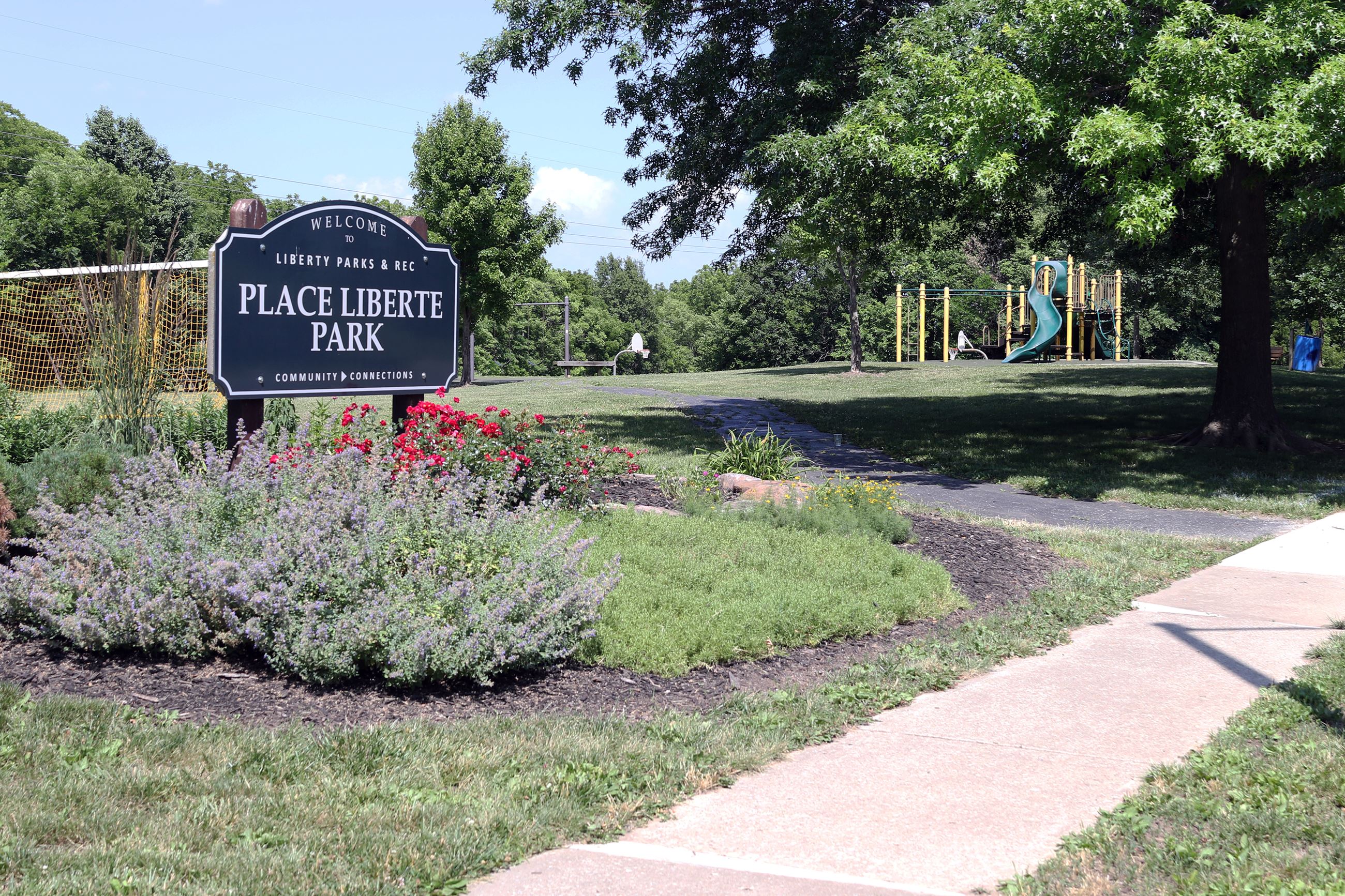Photo of the Place Liberte Park sign